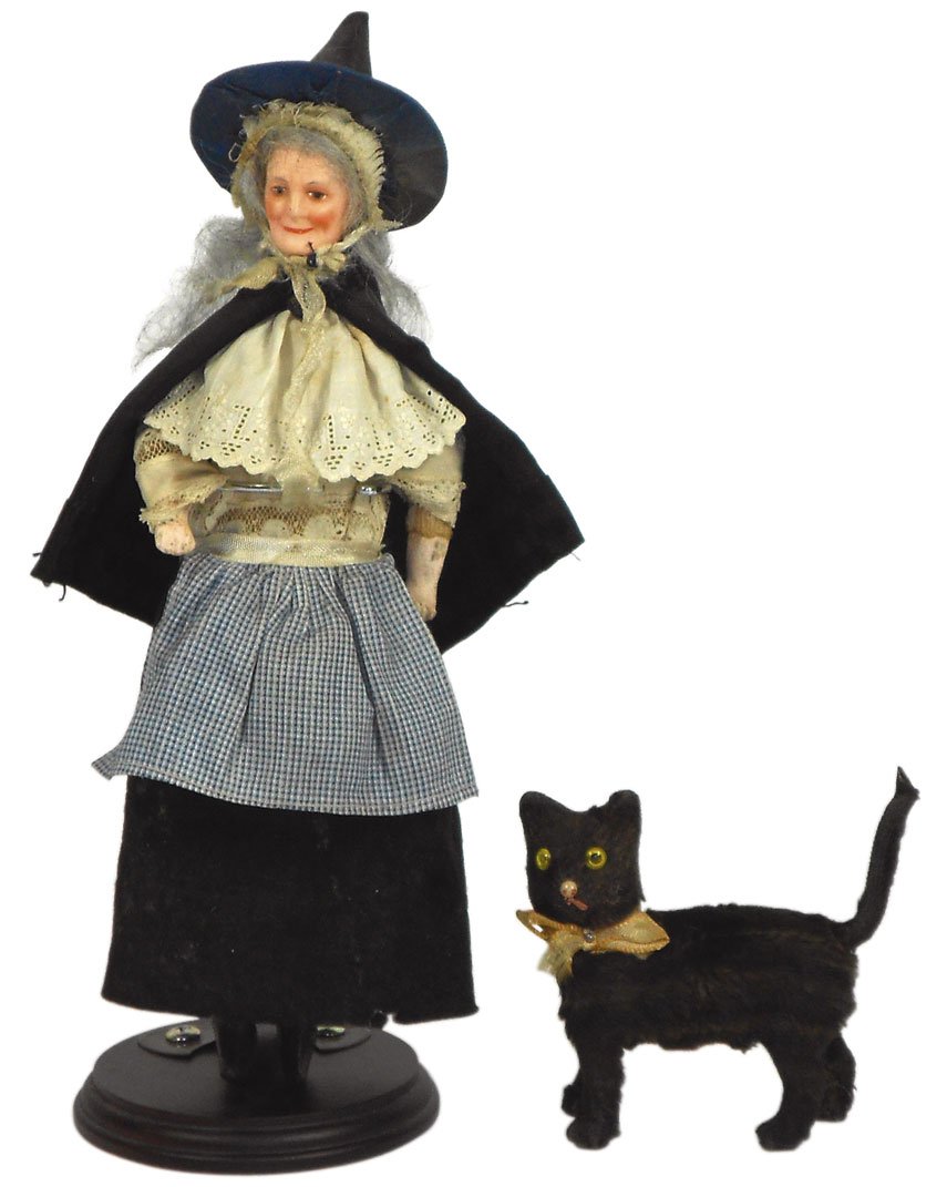 Halloween witch & black cat figures, witch has a : Halloween witch & black cat figures, witch has a detailed painted composition face, composition arms & legs & orig fabric clothing, 10"H. Black cat is fur covered, has glass eyes & spring center (no s