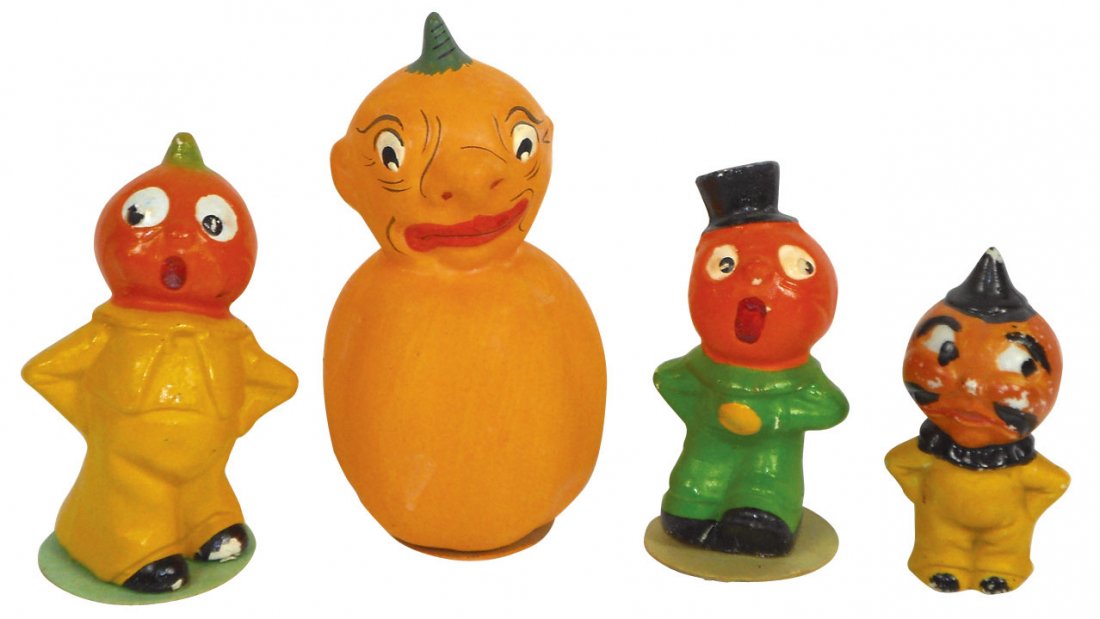 Halloween items (4), 2 composition pumpkin head g: Halloween items (4), 2 composition pumpkin head goblins, both marked Germany, 3.75"H, smaller bisque goblin, some paint loss, 3.25"H & goblin candy container, painted bisque, marked Germany, 5"H, VG t