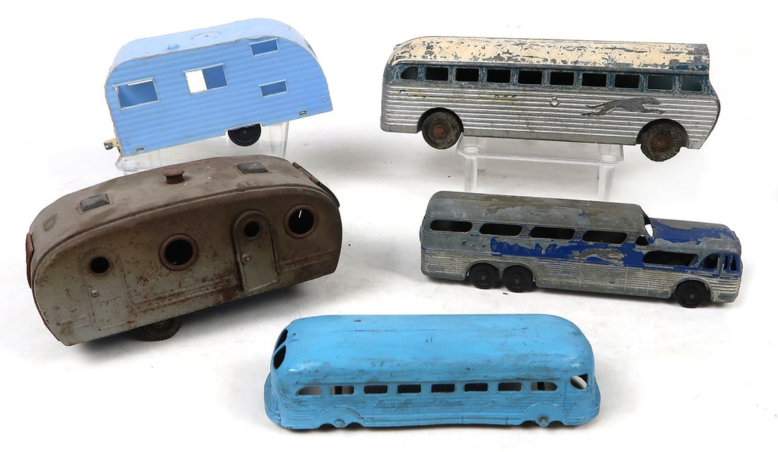 Toy Buses & Trailers (5), 3 different die-cast greyhound, a tin camper and (1 of 1)