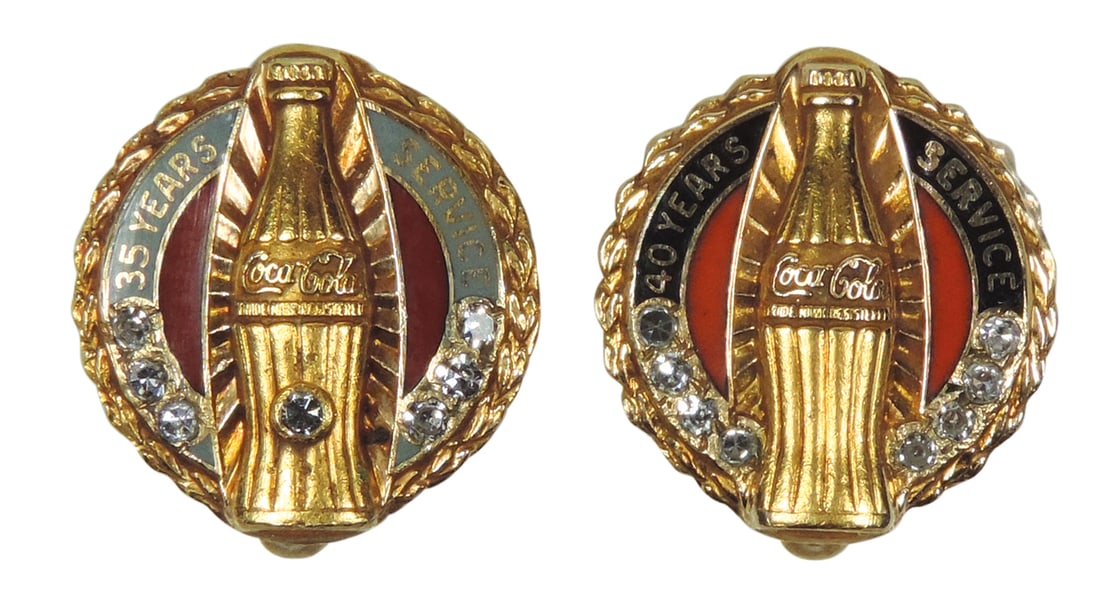 Coca-Cola Employee Emblem Pins (2), Recognition of 35 yrs-yellow gold, 7 (diamond) stones, c.1950's,: Coca-Cola Employee Emblem Pins (2), Recognition of 35 yrs-yellow gold, 7 (diamond) stones, c.1950's, reverse lower marked Dieges & Clust 10K & Rare 40 yrs-yellow gold, 8 (diamond) stones, reverse lowe