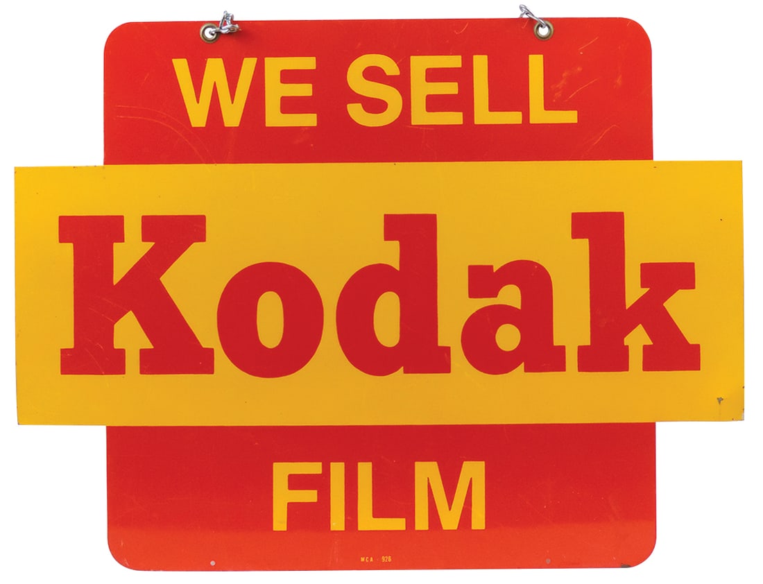 Drug Store Kodak Sign, double-sided diecut metal "We Sell Film", marked MCA 926, VG cond w/a shallow (1 of 2)