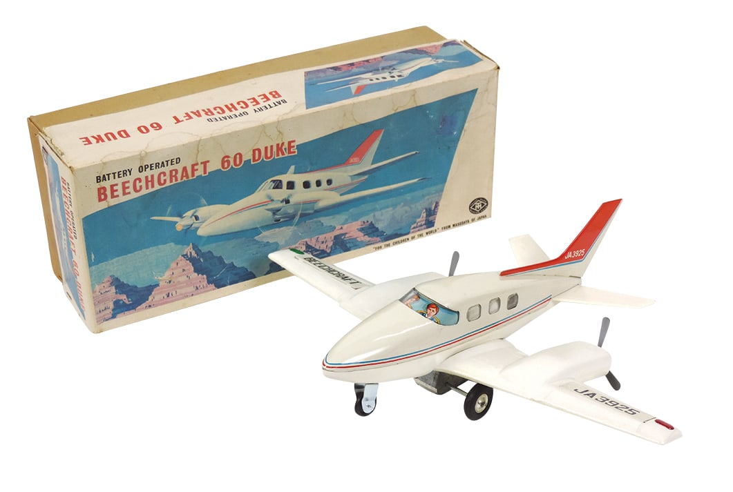 Toy Beechcraft 60 Duke Airplane, Masudaya-Japan litho on tin & plastic B-O, Near-Mint untes: Toy Beechcraft 60 Duke Airplane, Masudaya-Japan litho on tin & plastic B-O, Near-Mint untested cond in orig box, 15"L.