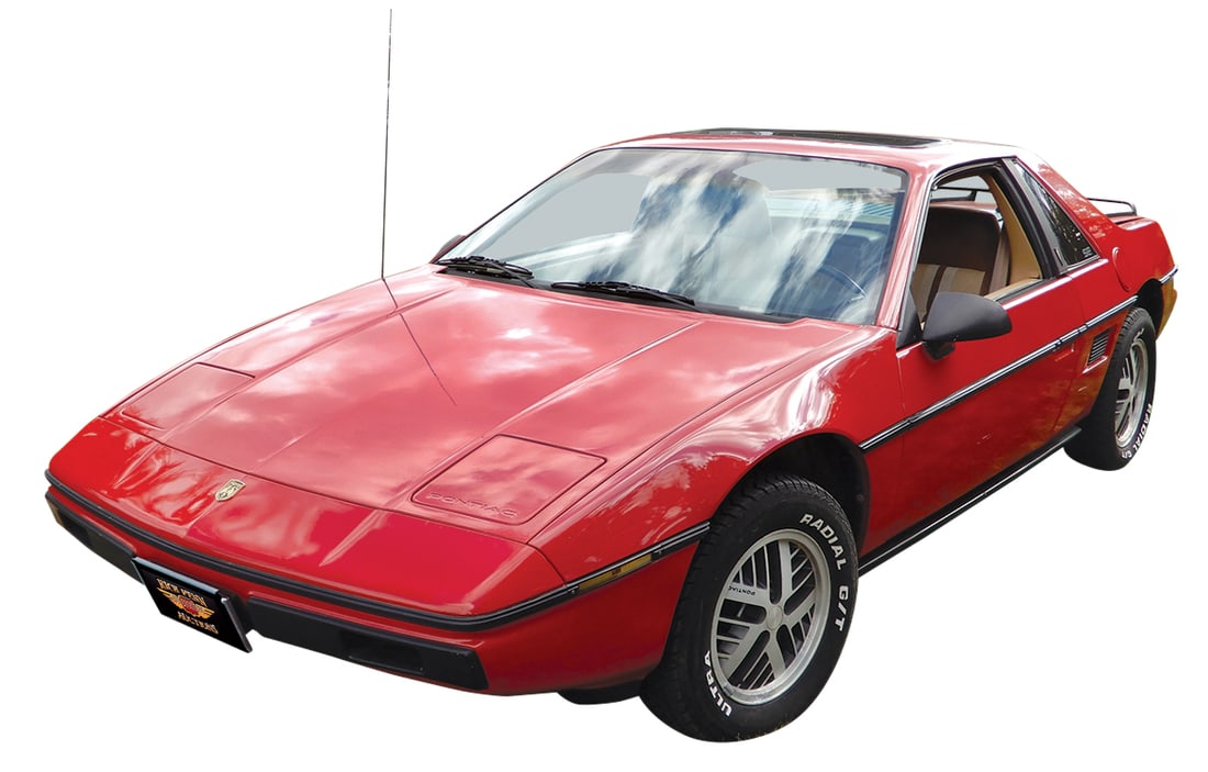 Automobile, 1984 Pontiac Fiero SE.: Automobile, 1984 Pontiac Fiero SE. "Bought from a buddy in a bar late one night," says Doug. Both participants in the deal may have been "over served." Doug says, "Never do that again!" The next day i