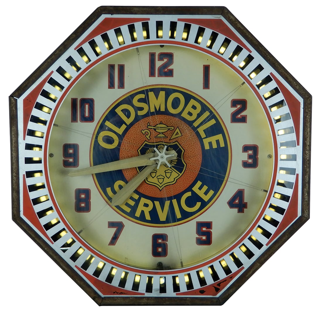 Automobilia, Oldsmobile Service Neon Spinner Clock, octagonal case w/yellow neon & animated motion, (1 of 2)