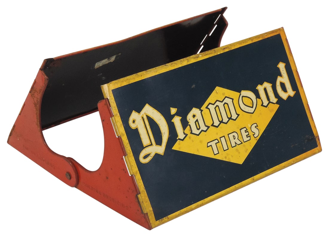 Automobilia Diamond Tires Display Stand, Doering Bros. litho on tin w/hinged panels folding flat,: Automobilia Diamond Tires Display Stand, Doering Bros. litho on tin w/hinged panels folding flat, Good+ cond w/one side showing better, 6.5"H x 13"L.