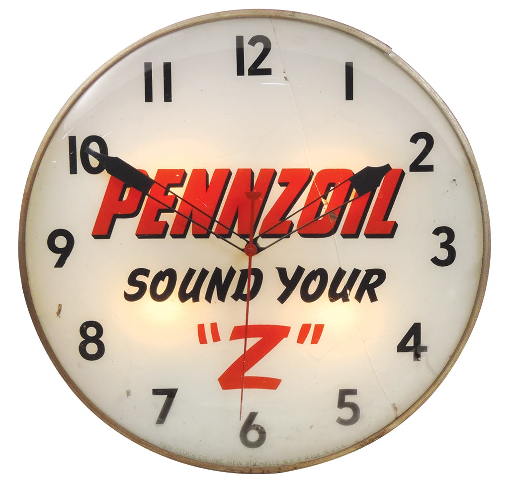 Petroliana Clock, Pennzoil "Sound Your Z", large Pam lightup, Good working cond w/crack to face: Petroliana Clock, Pennzoil "Sound Your Z", large Pam lightup, Good working cond w/crack to face glass, 20"Dia.