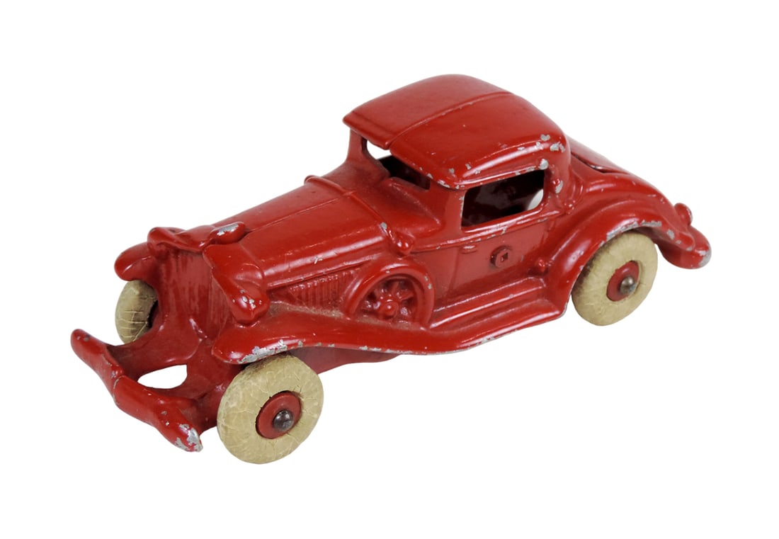 Toy coupe w/rumble seat, cast iron, take apart design, rubber tires are har (1 of 2)