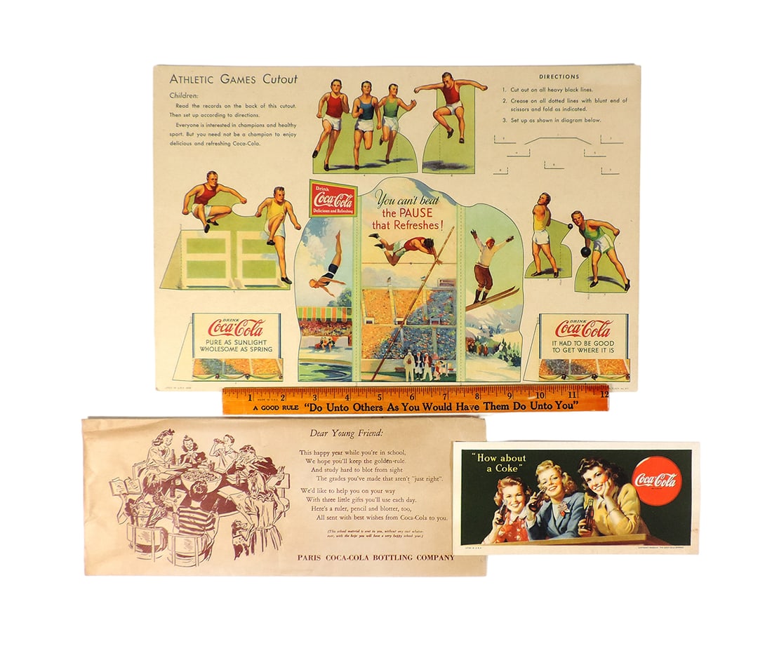 Coca-Cola Athletic Games Cutout by Snyder & Black & Coca-Cola ruler, blotte (1 of 1)