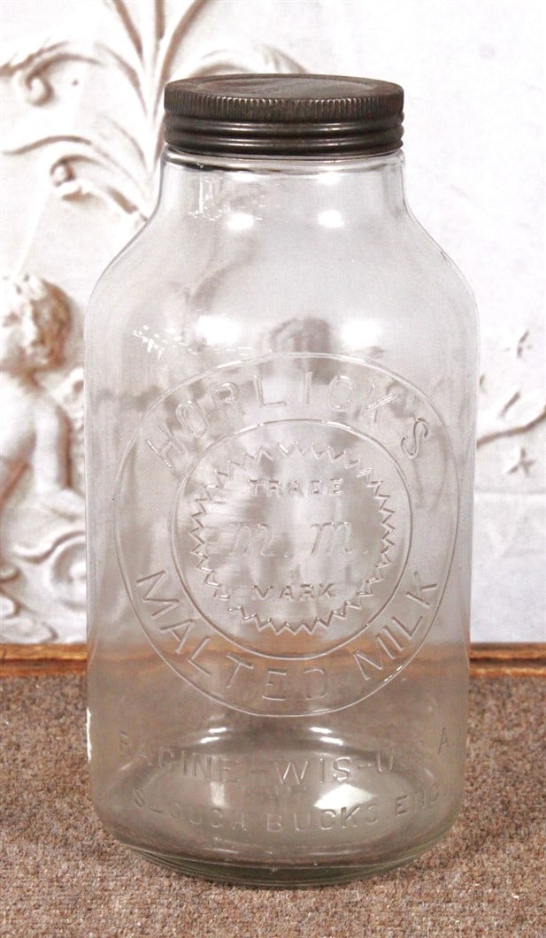 A Horlick's Malted Milk Glass Jar w/orig lid, VG cond. 11"H. (1 of 3)