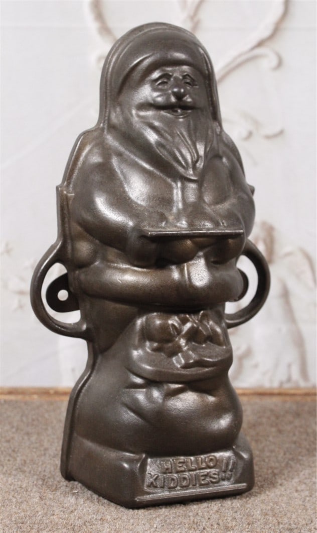 A Griswold "Hello Kiddies!!" cast iron Santa cake mold #897 & 898, Exc cond. 12"H. (1 of 4)
