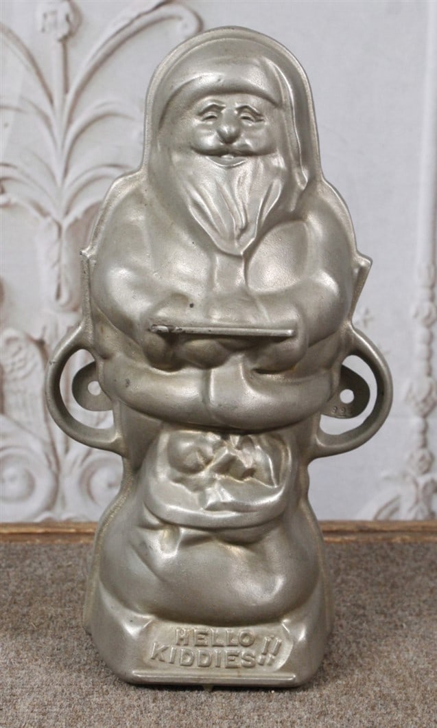 A Griswold Cast Iron "Hello Kiddies!!" Santa Cake Mold w/nickel-plate finish, Exc cond, 12"H. (1 of 4)