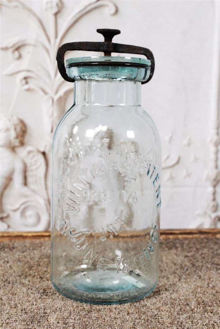 A Millville Atmospheric Fruit Jar w/orig lid, VG cond with chip to lid, 9"H. (1 of 3)