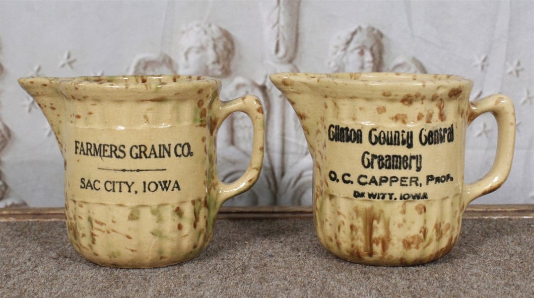 Pr Spatter decorated advertising stoneware jugs for "Farmers Grain Co Sac City, Iowa" & "Clinton (1 of 1)