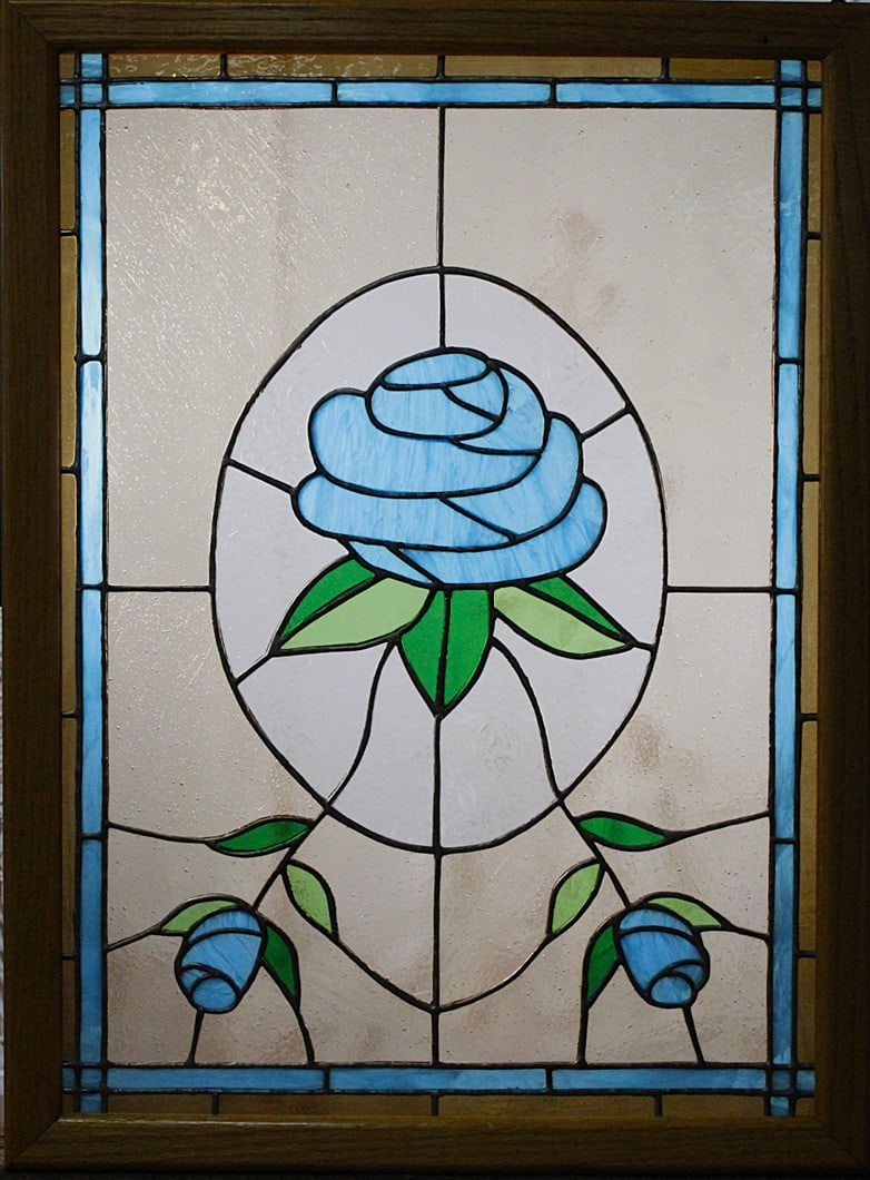 A Stained & Leaded Glass panel of a large blue rose in wood frame, Exc cond. 28.5"H x 21"W.: A Stained & Leaded Glass panel of a large blue rose in wood frame, Exc cond. 28.5"H x 21"W.