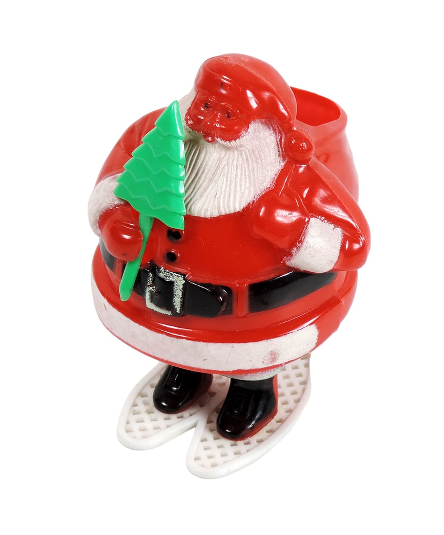 Christmas Santa Candy Container on white snow shoes holding green tree, c.1 (1 of 3)