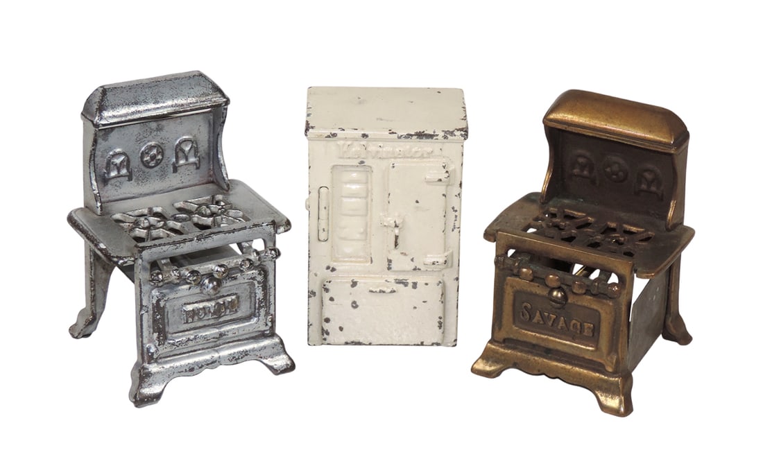Antique Child's Miniature Kitchenware (3), Arcade cast metal KELVINATOR Ref: Antique Child's Miniature Kitchenware (3), Arcade cast metal KELVINATOR Refrigerator Still Bank, cream colored, SAVAGE Mini Stove, cast iron/metal & ROYER, Mini Stove, cast iron, VG cond w/some age-re
