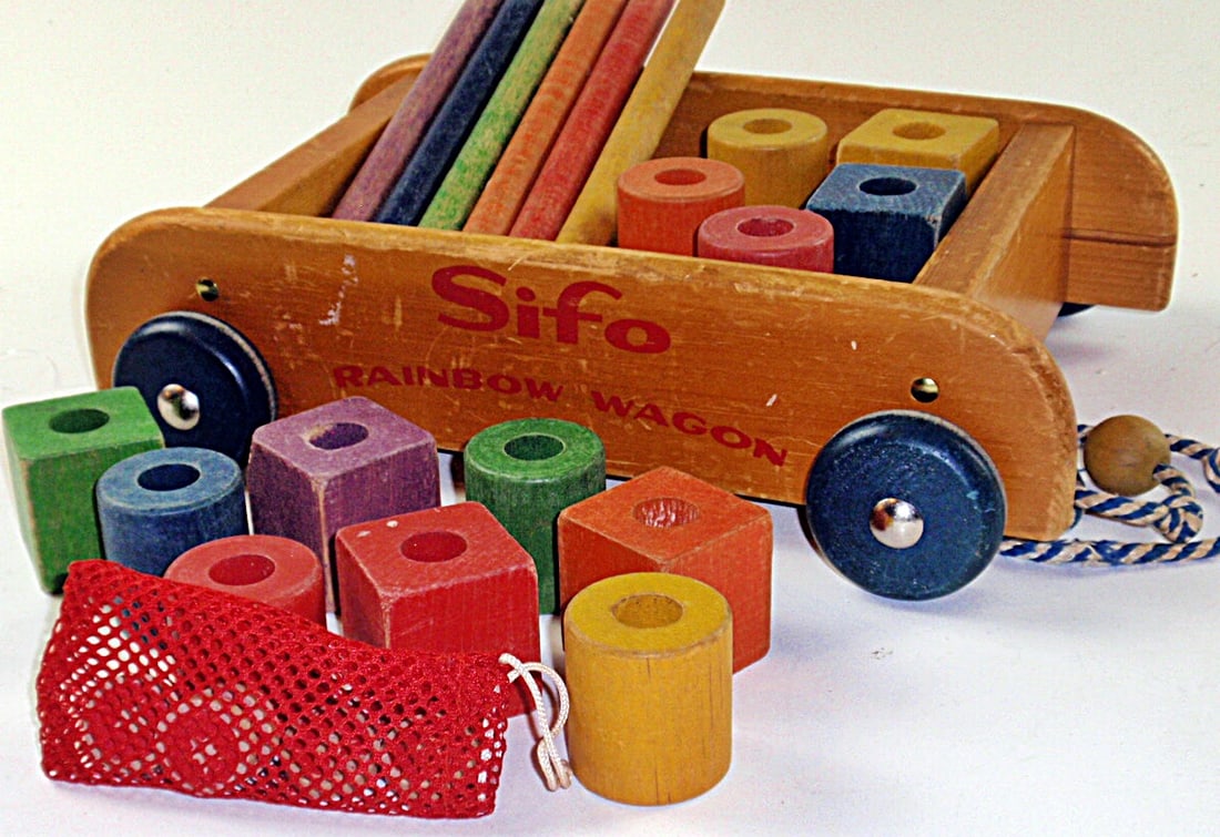 A Sifo Rainbow Wagon Child's Pull Toy Building Set: Polychrome wood, in VG+ cond. 13".