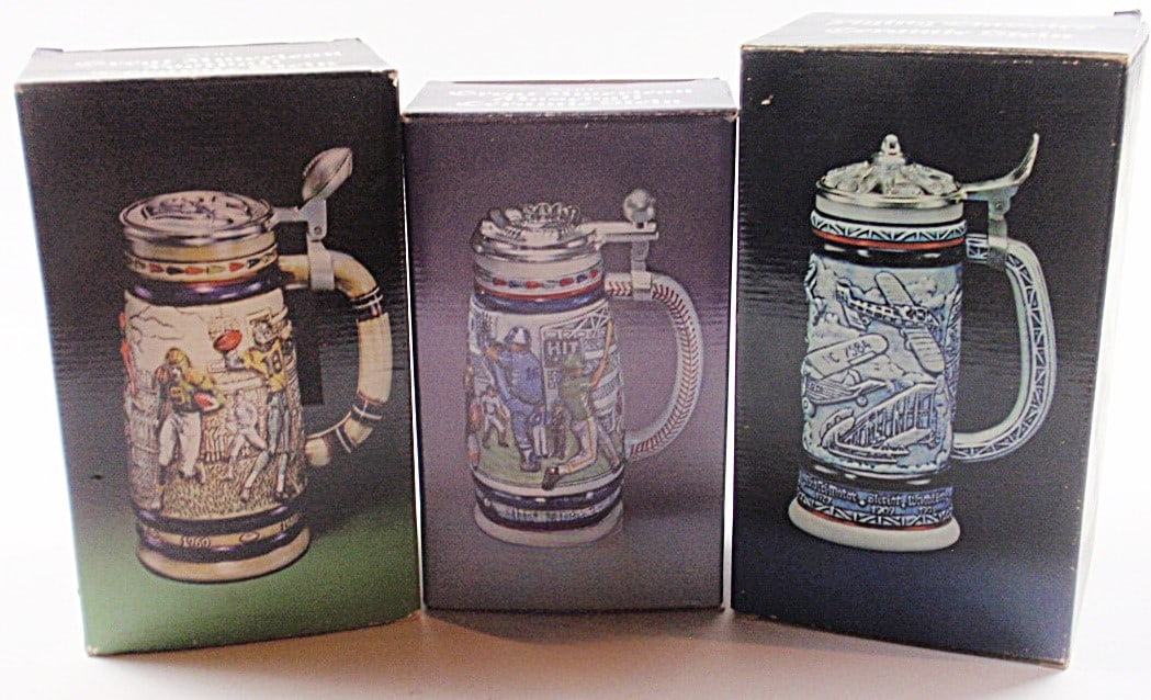 3 Vintage Avon Beer Steins: With Football, Basketball and Flying Classics themes, Mint in orig boxes, Largest 10.5”T.