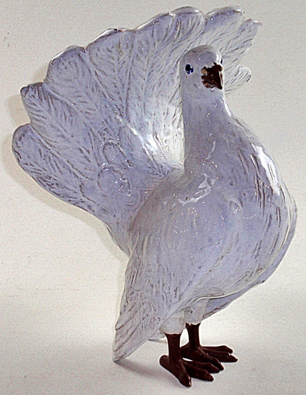 A French Pottery Peacock Dove: White glazed with cast metal feet, marked "Made in France" Exc cond 12"H.