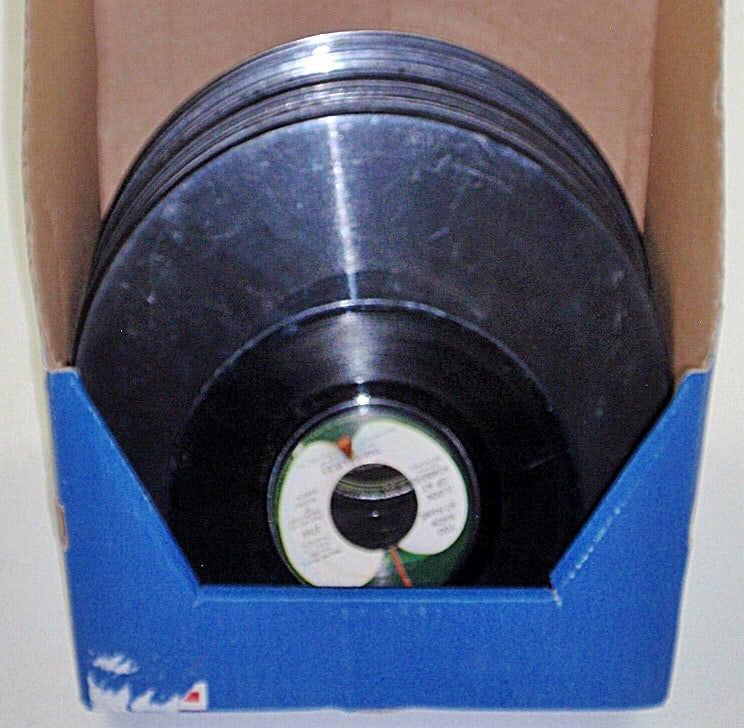 Vintage record album and lot of records: Album is hard covered, red, embossed, and holds and includes 12 records. Plus an additional 30 records are included. All in fair to VG condition. Album is 12" x 11".