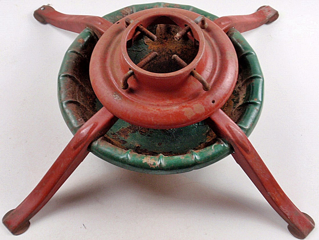 Vintage metal tree stand: Large red and green tree stand, well used. 31" x 6".