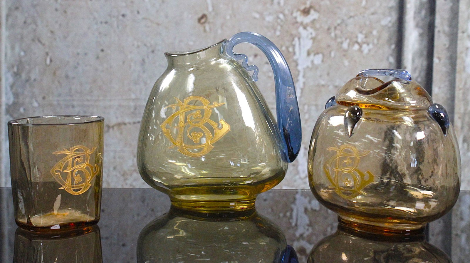 A 3Pc Felix Bracquemond Art Glass Table Setting: Circa 1879 in topaz and blue for Haviland & Co. comprising a jug, covered jar & tumble with etched & gilt BG monogramed, Each piece lightly embossed "H&Co" Exc. cond. Largest 6.5"H.