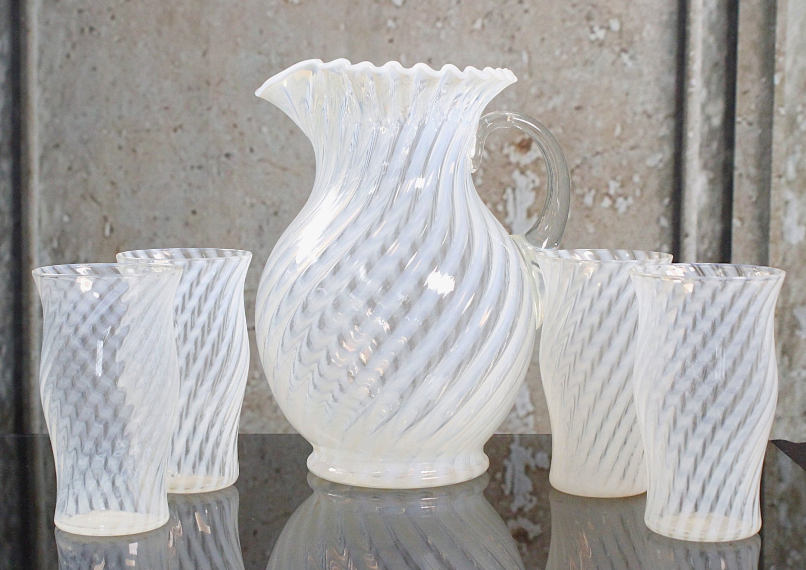 A Victorian Opalescent Swirl Beverage Set: Circa 1900 pitcher & 4 tumblers likely by Northwood, Exc. cond. Largest 9.5"H.
