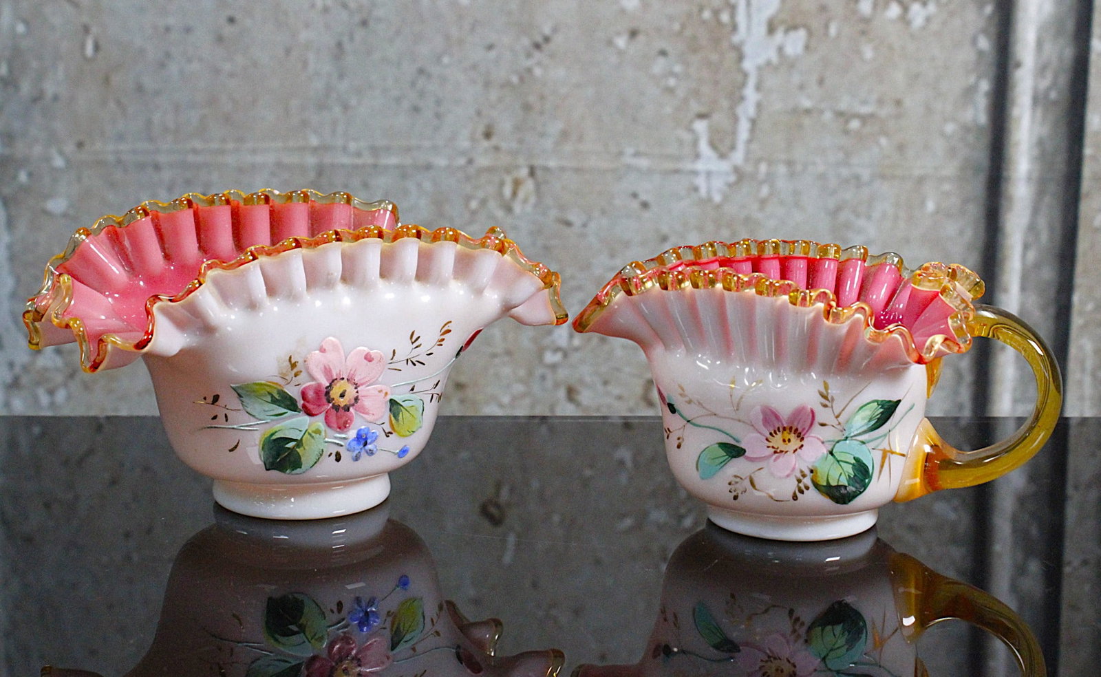A Victorian Art Glass Cream & Sugar: Cased opal/pink glass with enameled flowers and applied amber, Exc. cond. 6.5"W.
