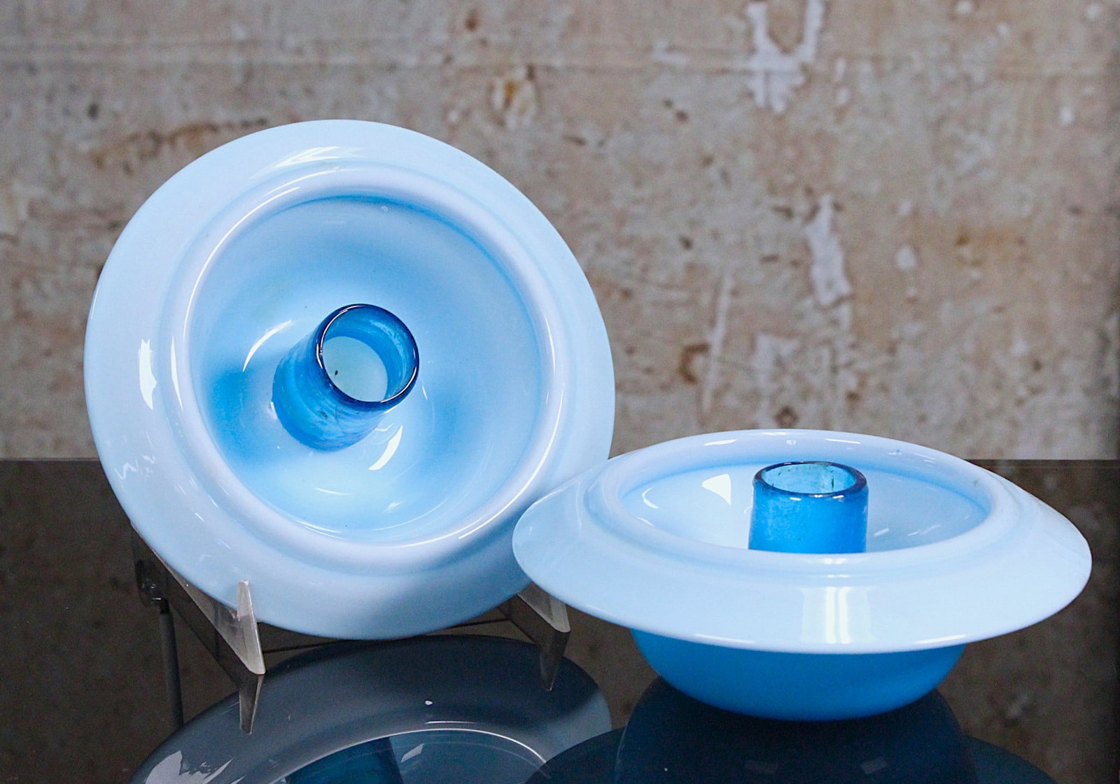 A Pair Of Blue Opaline Candle Holders: With sapphire blue sockets, Exc. cond. noting a heat check to one socket, 5.75"Dia.