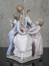 A Lladro Porcelain Figure "A Gift Of Love"