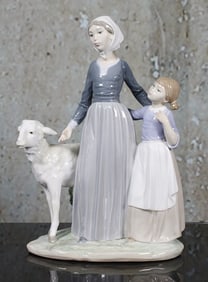 A Lladro Porcelain Figure "Mother With Child & Lamb"