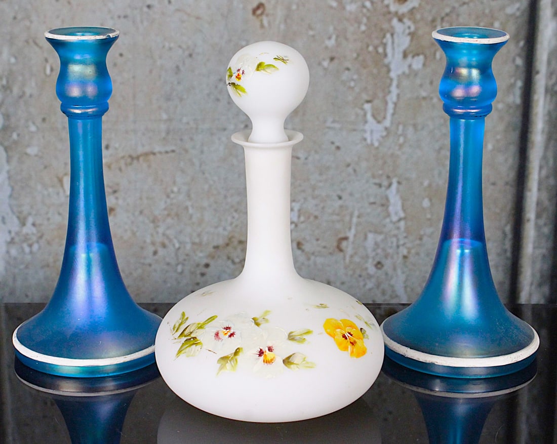 3 Pc Victorian Glass: Pair of Northwood blue satin stretch glass candle sticks and an enameled opaline glass decanter with ground pontil, VG & Exc cond the former with a few chips to white overlay, Largest 9.5"H.