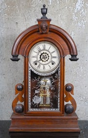A Victorian Walnut Shelf Clock By Ansonia