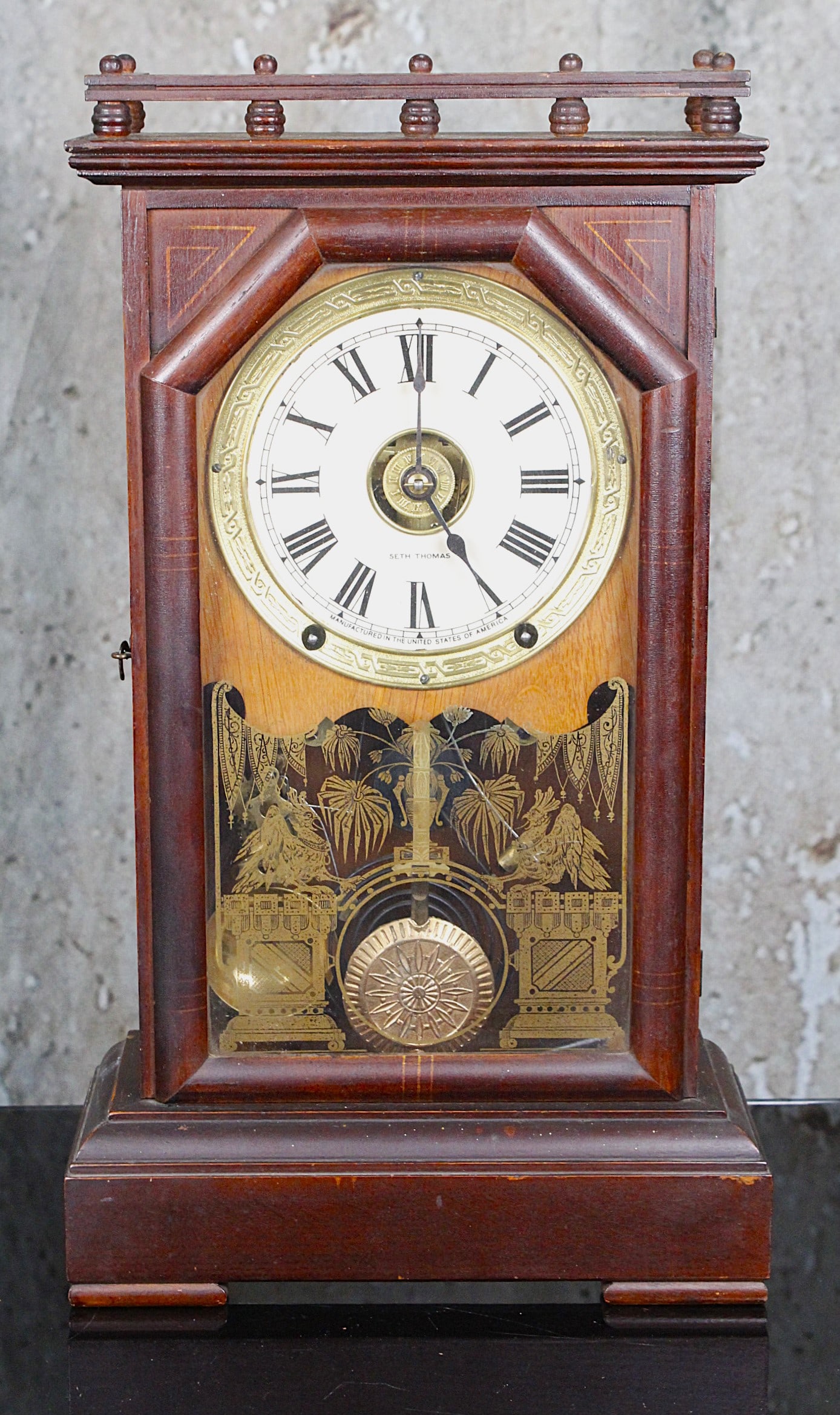 A Seth Thomas Victorian Walnut Shelf Clock: 8 Day with chimes and alarm in VG+ working cond & orig finish, 19"H.