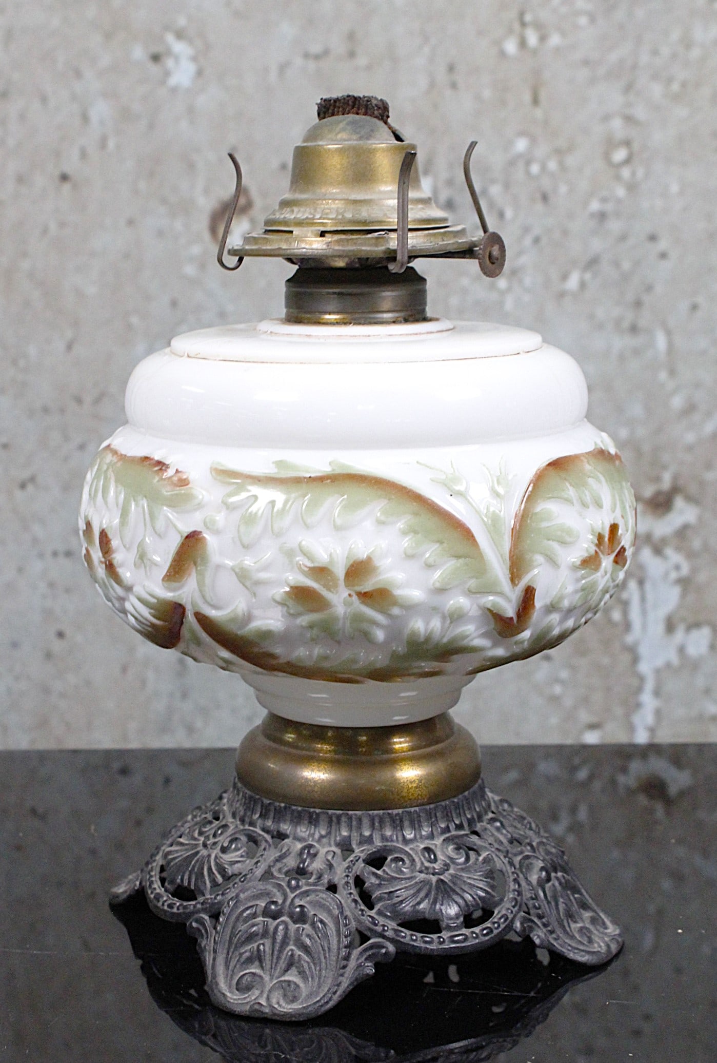 A Victorian Oil Lamp: Embossed opal font with Good Housekeeper burner likely by Miller, Exc cond includes chimney not illustrated, 10"H.