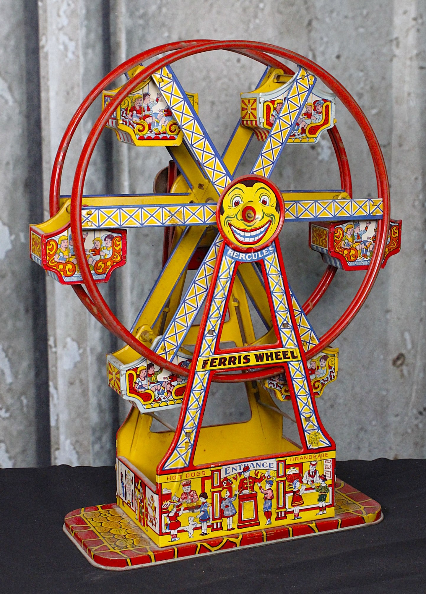 A Chein Hercules Wind-Up Toy Ferris Wheel: Tin litho circa 1930s VG non working cond. 17"H.