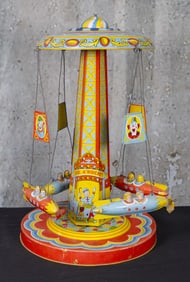 A Chein "Ride A Rocket" Wind-Up Toy
