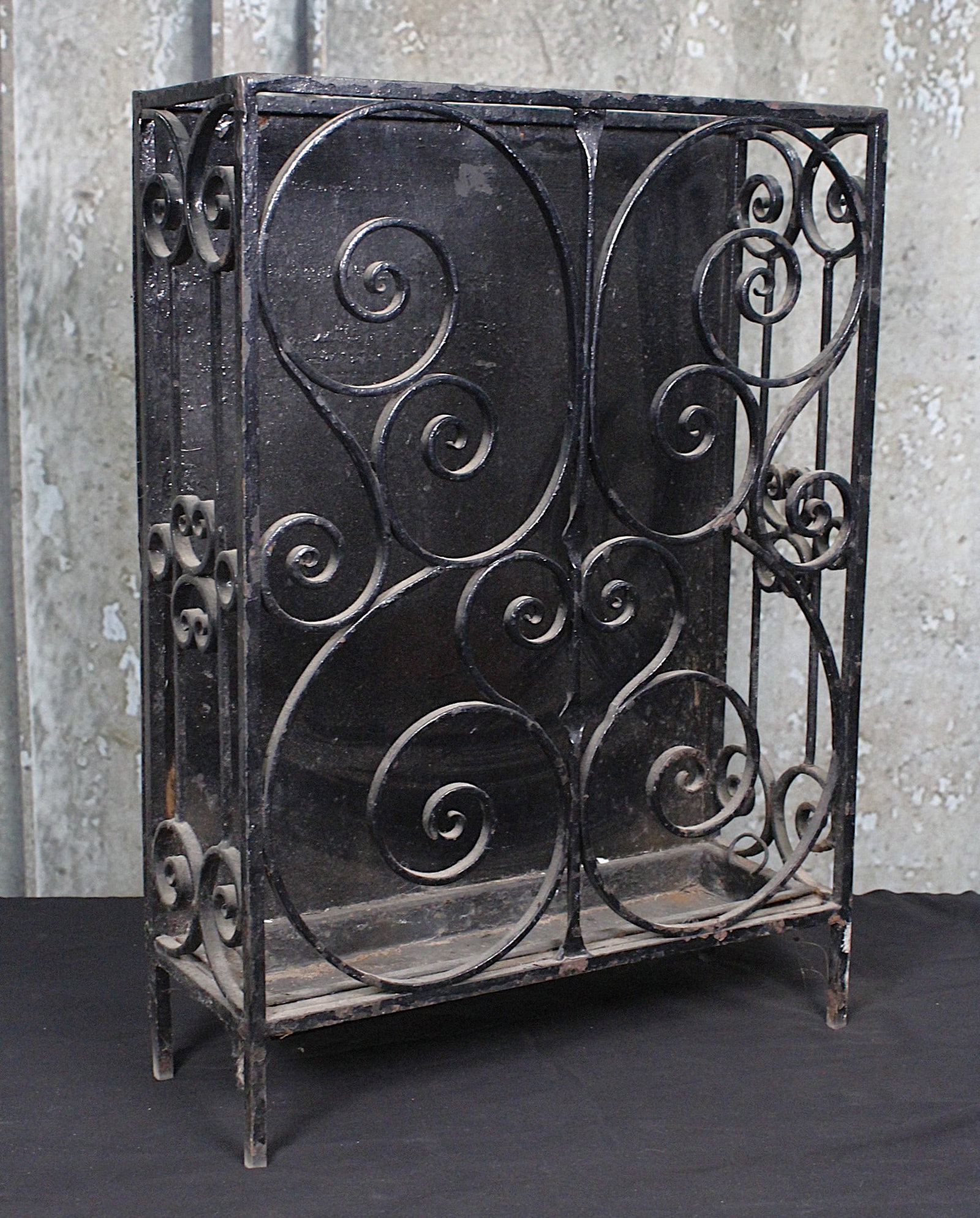 A Vintage Wrought Iron Planter Stand: With scrolled iron work and tin pan at base, likely for a radio or aquarium, G+ cond, 23"H x 16"W x 6.5"D.