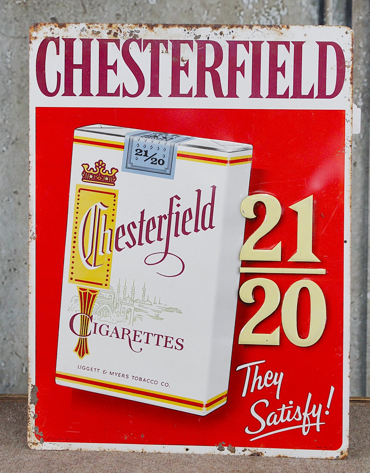 A Chesterfield Cigarettes Advertising Sign: Embossed tin litho, G+ cond, 24"H x 18"W.