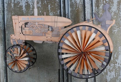 An Allis-Chalmers Tractor Whirlygig Lawn Ornament