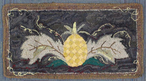 A Folk Art Hooked Rag Rug