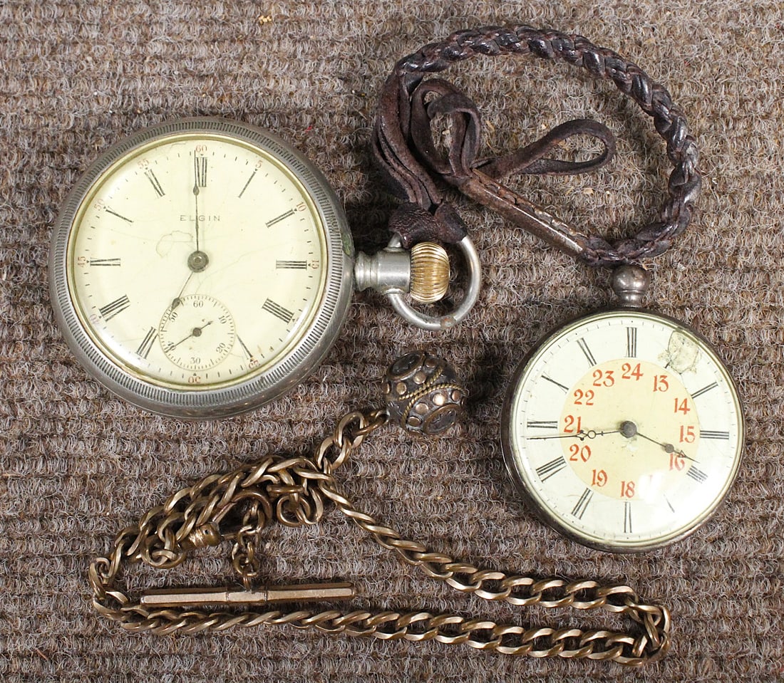 Two Pocket Watches: A Coin silver cased key wind (untested and losses to dial, and an Elgin in silveroid case, together w/a chain fob with mixed metals sphere. Neither working, larger 2.25"Dia.