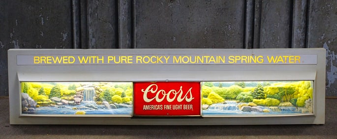 A Coors Beer Lighted Advertising Sign