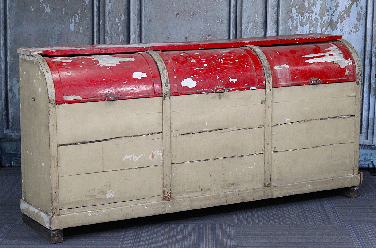 A Country Store Triple Cylinder Roll Grain Bin: 19th century pine with original red & cream paint, as found cond with losses, but structurally stable, 39"H x 80"L x 20"D.
