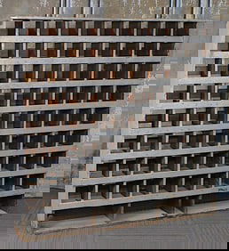 A Gray Painted Country Store Pine Pigeon-Holed Cabinet