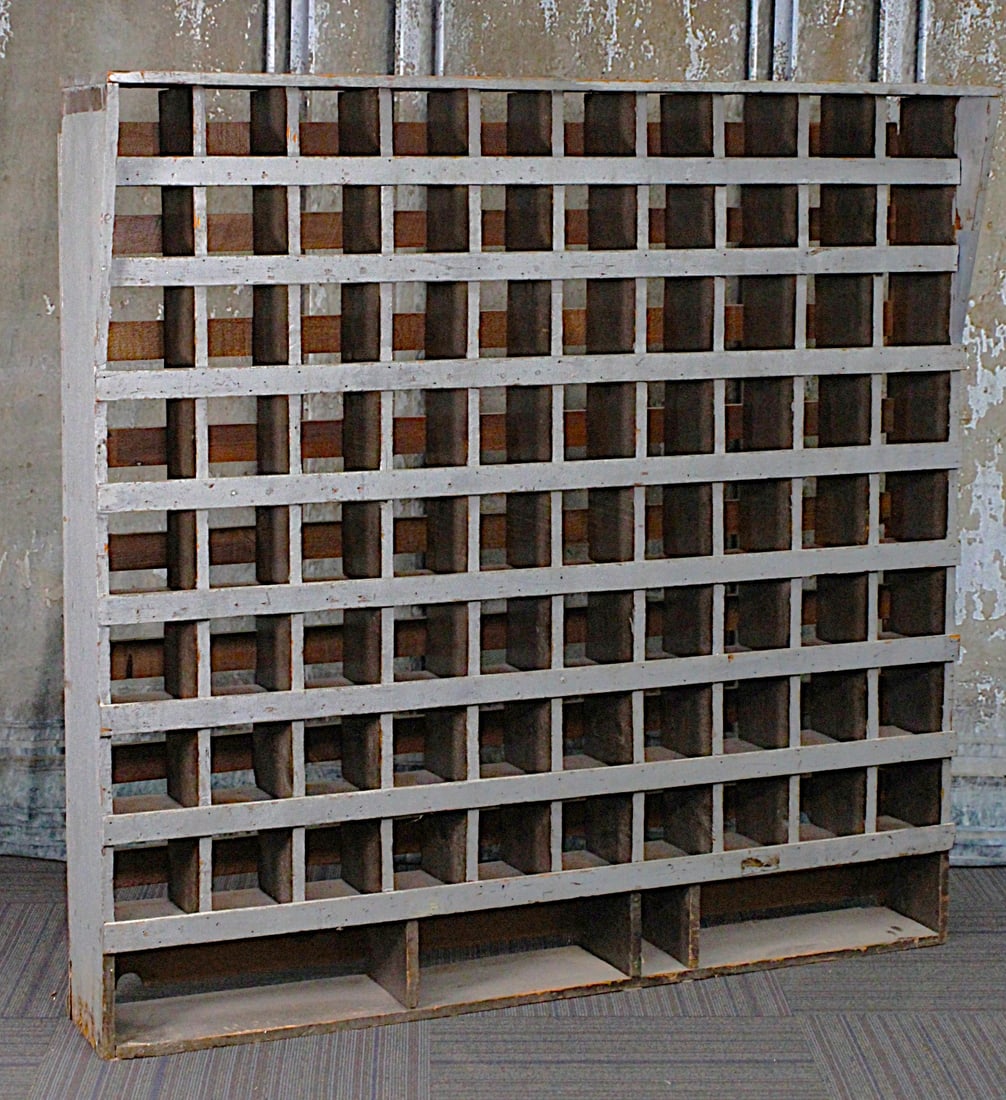 A Gray Painted Country Store Pine Pigeon-Holed Cabinet: C.1900 with 8 horizontal shelves, each with 10 divisions, G+ cond, 61"H x 62"L x 12"D at overhang,