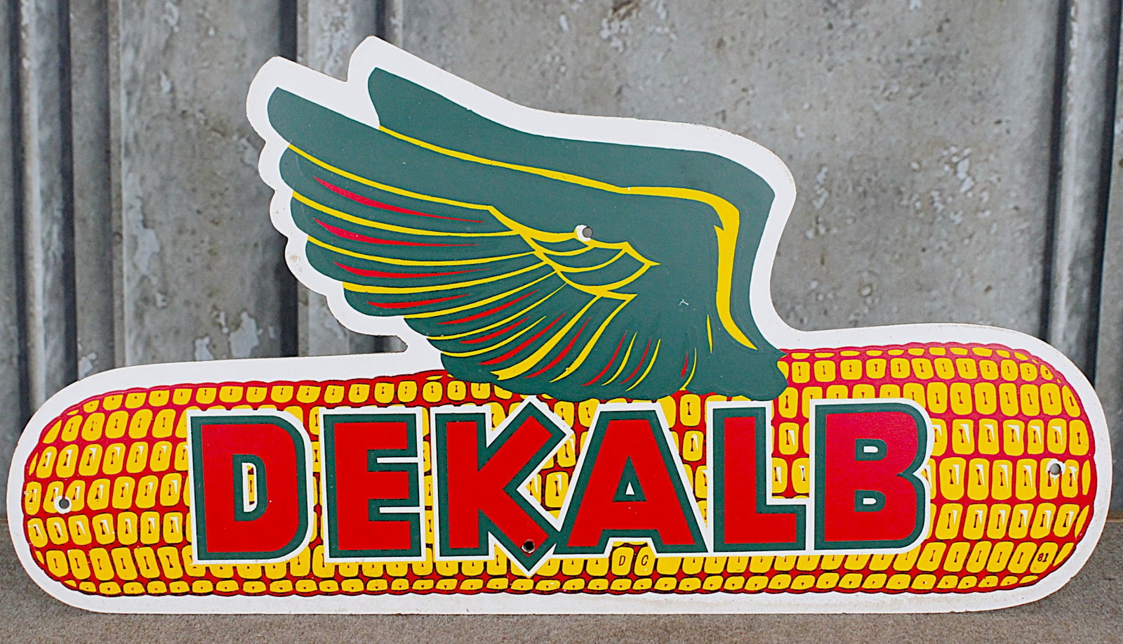 A Dekalb Advertising Corn Field Sign: Die-cut screen printed Masonite in near mint cond. Dtd 1981, 16"H x 31"L