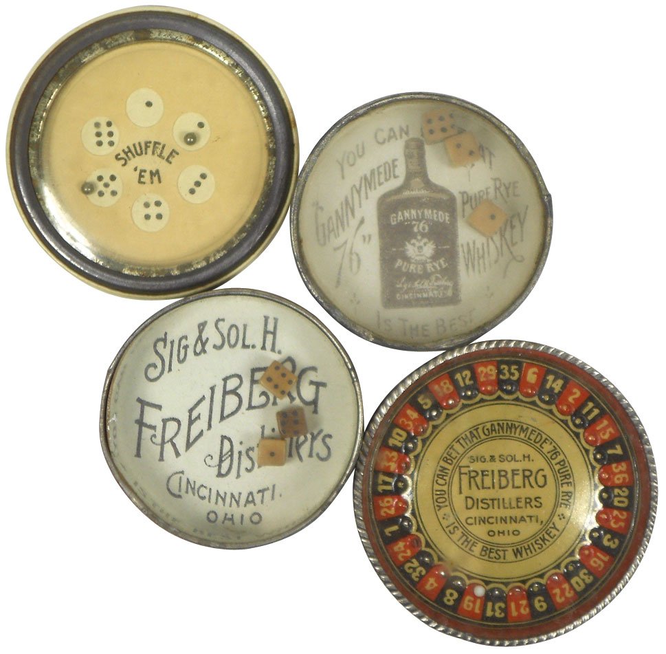 Advertising dexterity games (4), dice games for Freiber: Advertising dexterity games (4), dice games for Freiberg Distillers (Exc) & Gannymede Whiskey (VG), roulette wheel for Gannymede Distillers (Exc) & celluloid Shuffle 'Em from The Philip Carey Co., all