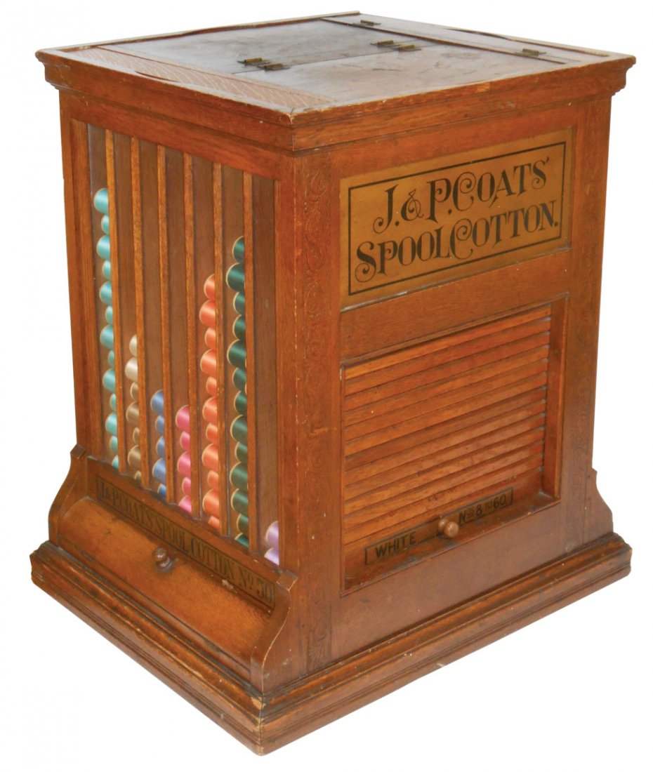 Country store spool cabinet, J.&P. Coats' Spool Cotton,: Country store spool cabinet, J.&P. Coats' Spool Cotton, square w/roll-up doors on 2 sides, windows on others, divided hinged top (one board missing hinges), swivels, c.1890, VG cond w/orig surface, 23
