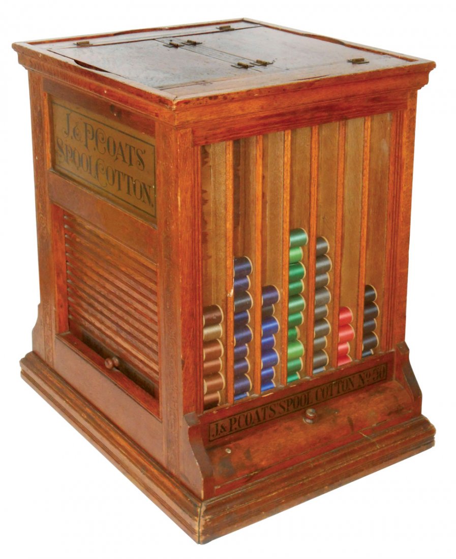 Country store spool cabinet, J.&P. Coats' Spool Cotton,: Country store spool cabinet, J.&P. Coats' Spool Cotton, square w/roll-up doors on 2 sides, windows on others, divided hinged top, c.1890, VG cond w/orig surface, 23.5"H x 16"W x 15"D.